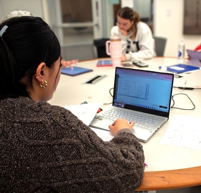 image of students in a classroom with a group study session