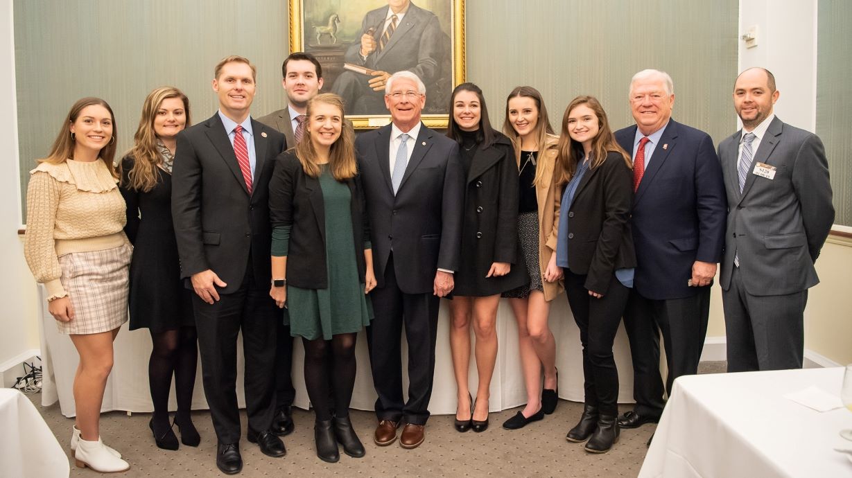 Group of students standing together with US Senator