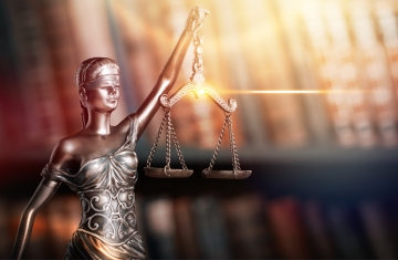 image of statue of justice holding scales