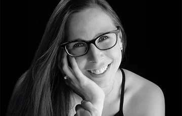 Black and white close-cropped portrait of Carrie Smith