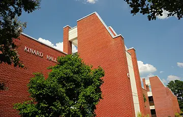 exterior of red brick building.  "Kinard Hall" written on exterior of building