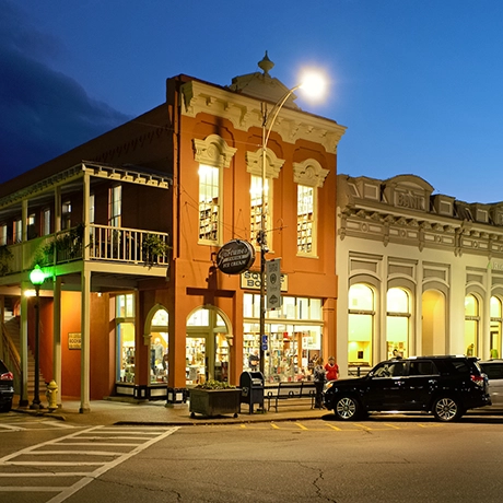 Oxford, MS downtown square at night. Squarebooks Bookstore corner building is focus.