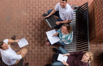 four economics students 