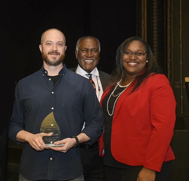 image of JT Thomas and two other people