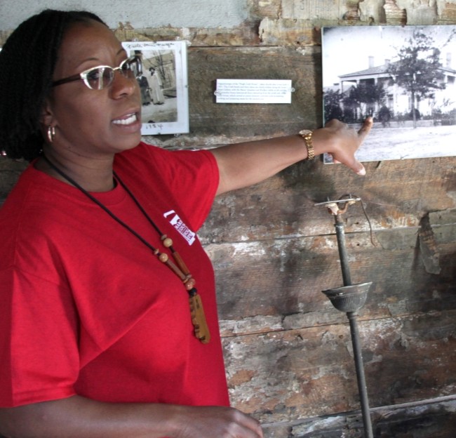 image of skipper pointing to a photo on the wall