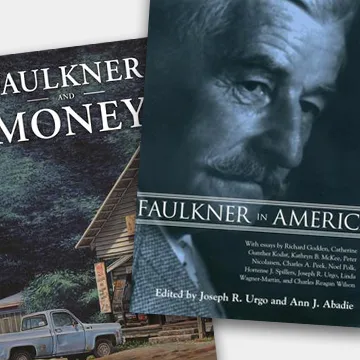two stacked books. Predominant cover has blue toned image of William Faulkner. Title of book is: "Faulkner in America"