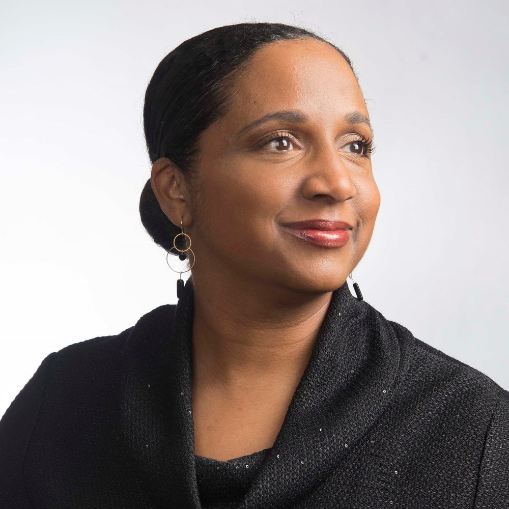 portrait of Daina Ramey Berry, head turned to side
