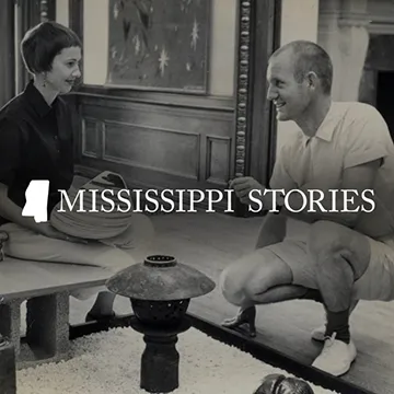 "Mississippi Stories" on top of dark gray photo of man and woman