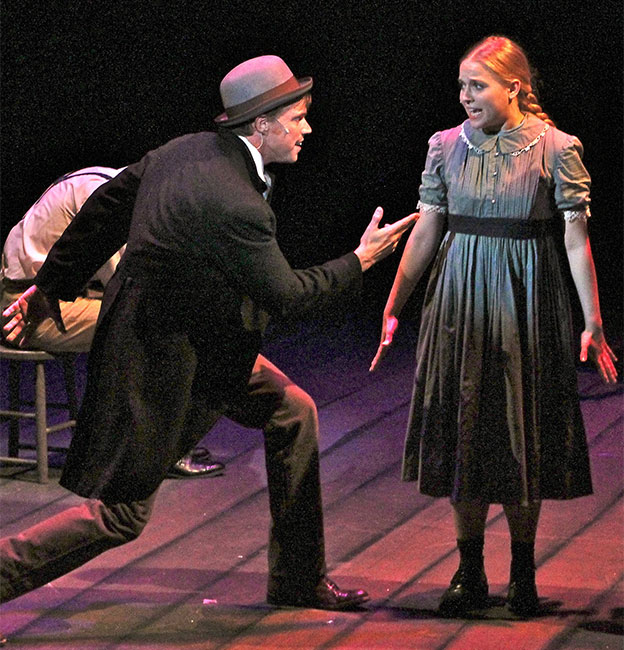 Joe Jackson on stage with a woman