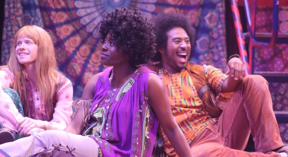 students on stage in full costume for performance of Hair