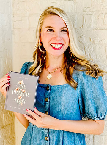 woman holding book