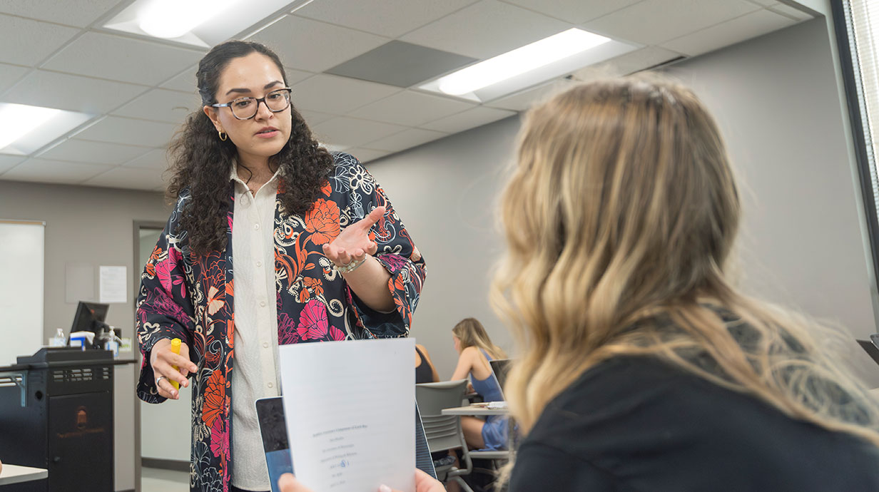 teacher talking to a student