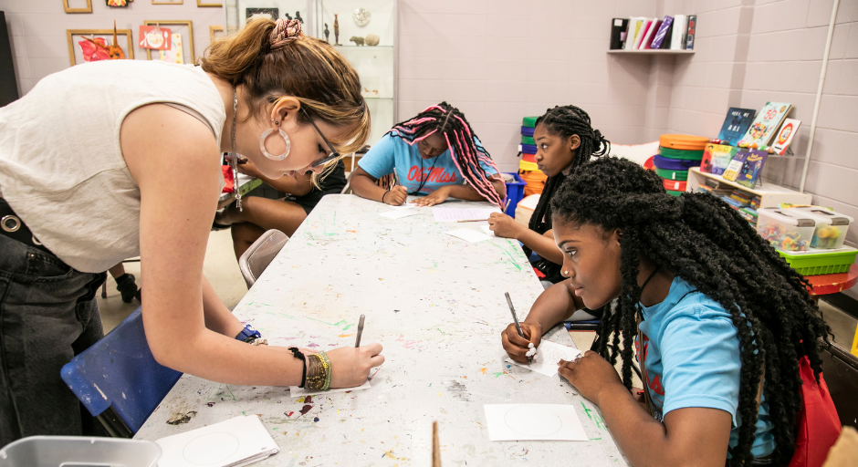 Community member working with a student participant