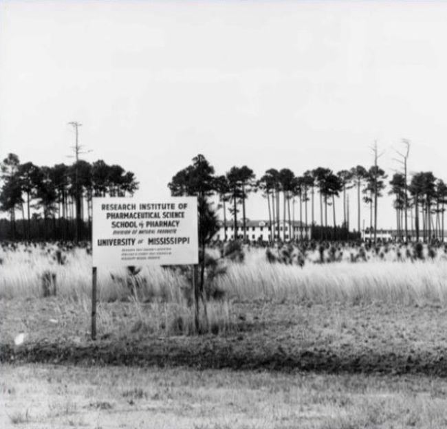 Historical photo of sign at the university for cannabis growth