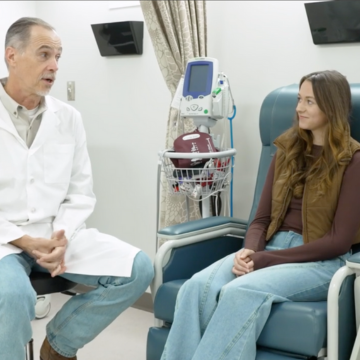 NCCRE researcher speaking to patient