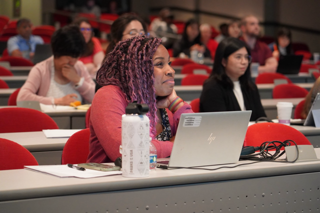 Participant listening to a lecture.