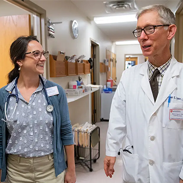 Doctor and Pharmacist talking together
