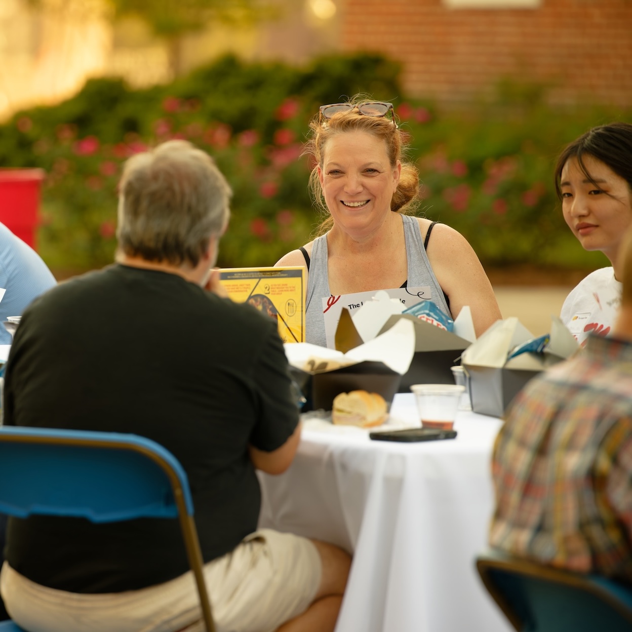 Participants talk across a table