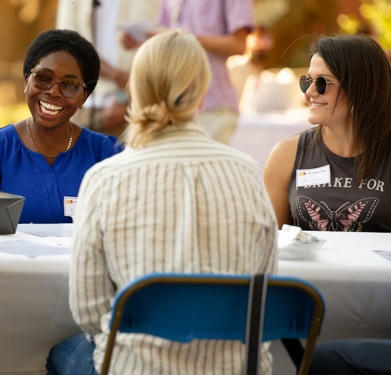 Participants talk across a table