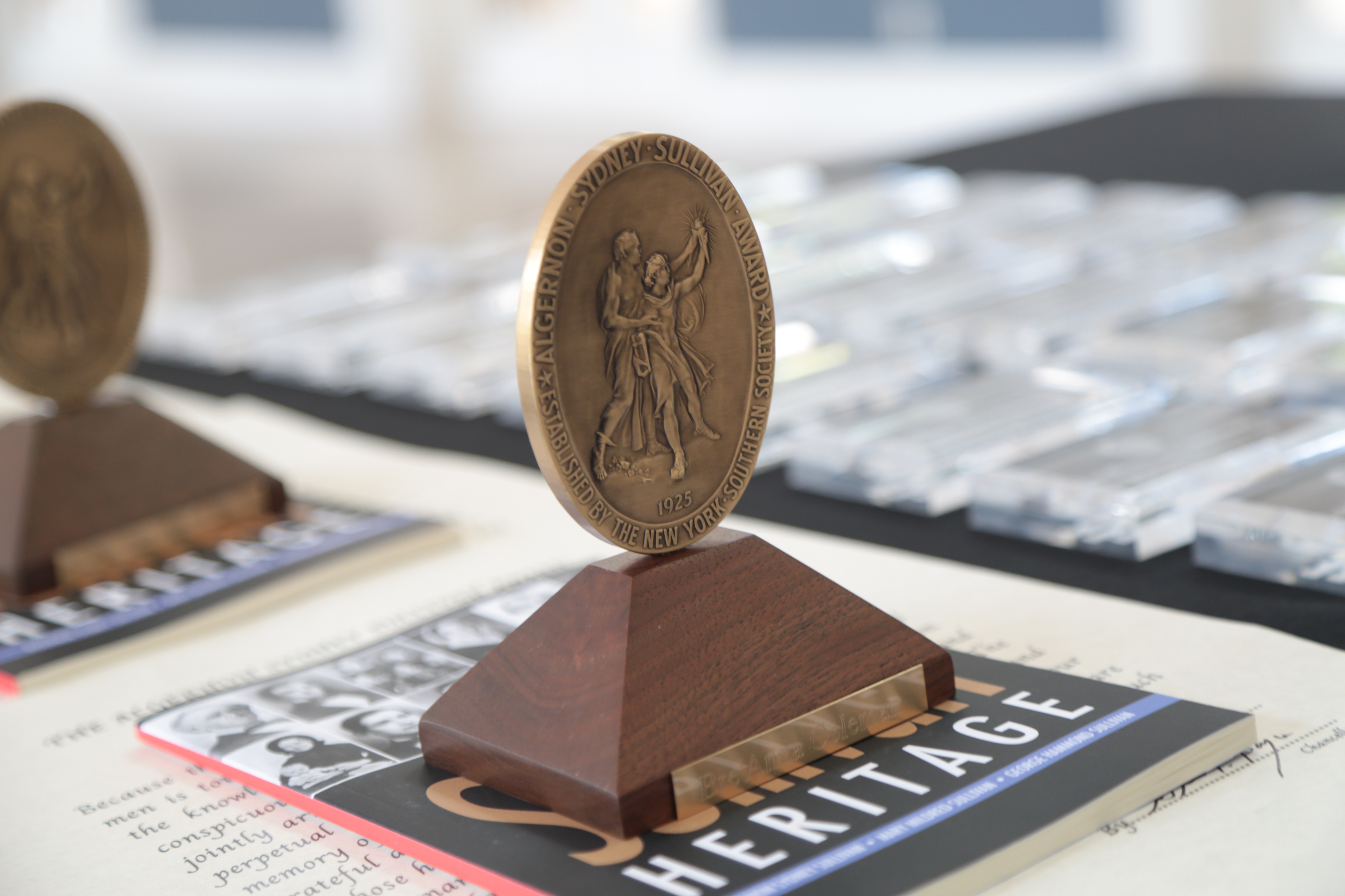 picture of a bronze award medallion with the Sullivan Foundation logo on the front