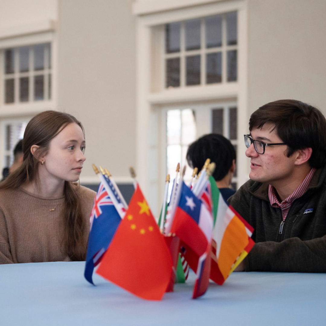 Croft students sitting at a table talking