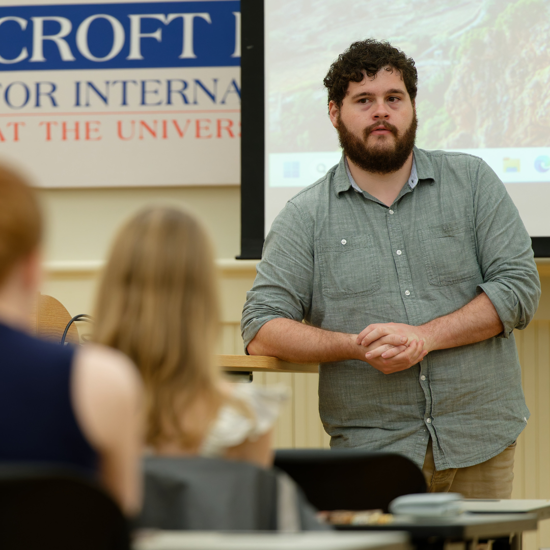Croft professor talking with students