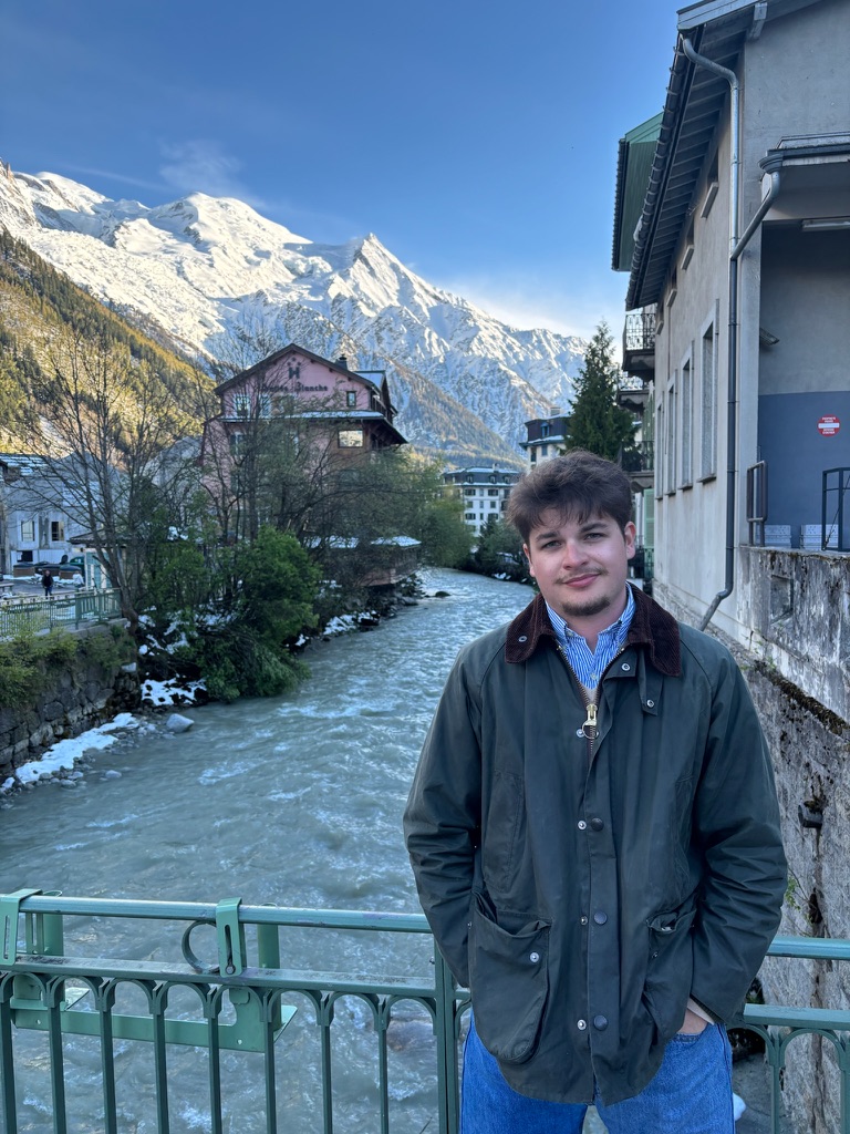 Student in front of French river