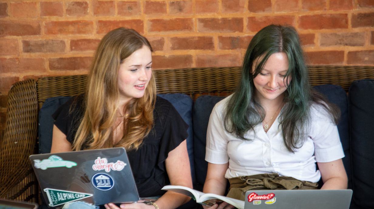 Students studying next to each other