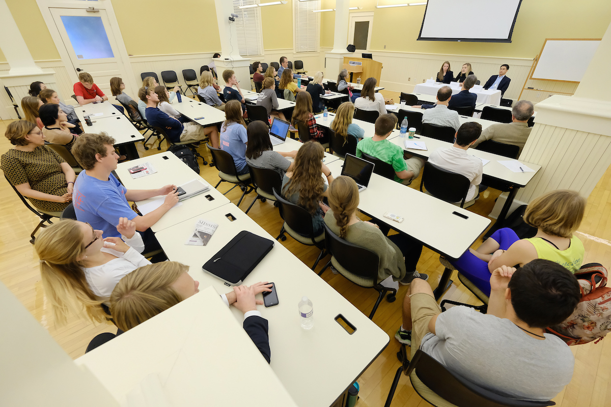 Students in a room having discussion