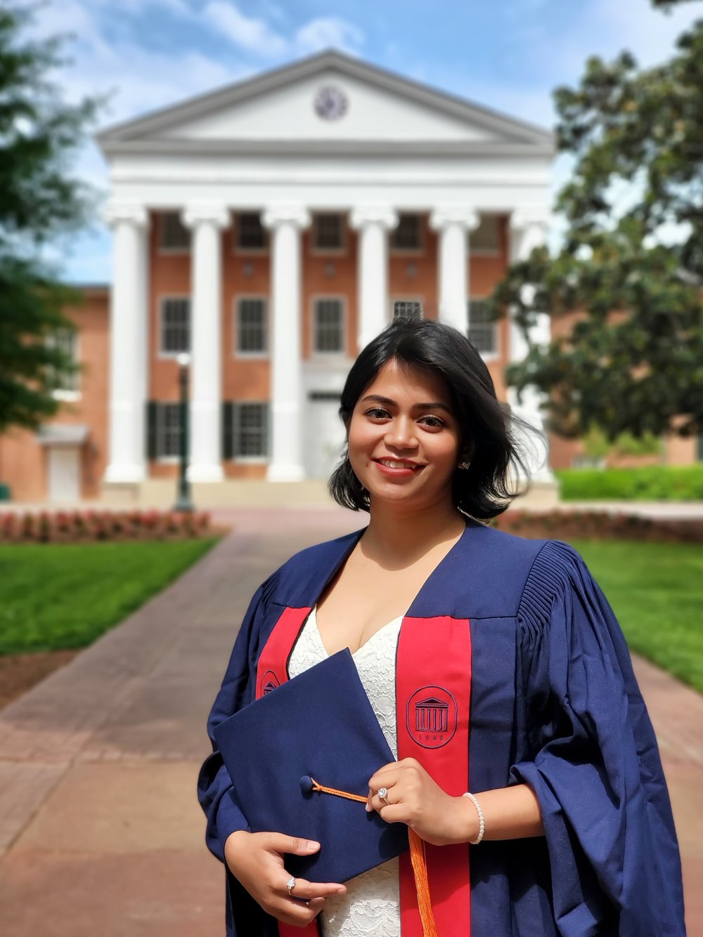 young woman in a graduation cap and gown