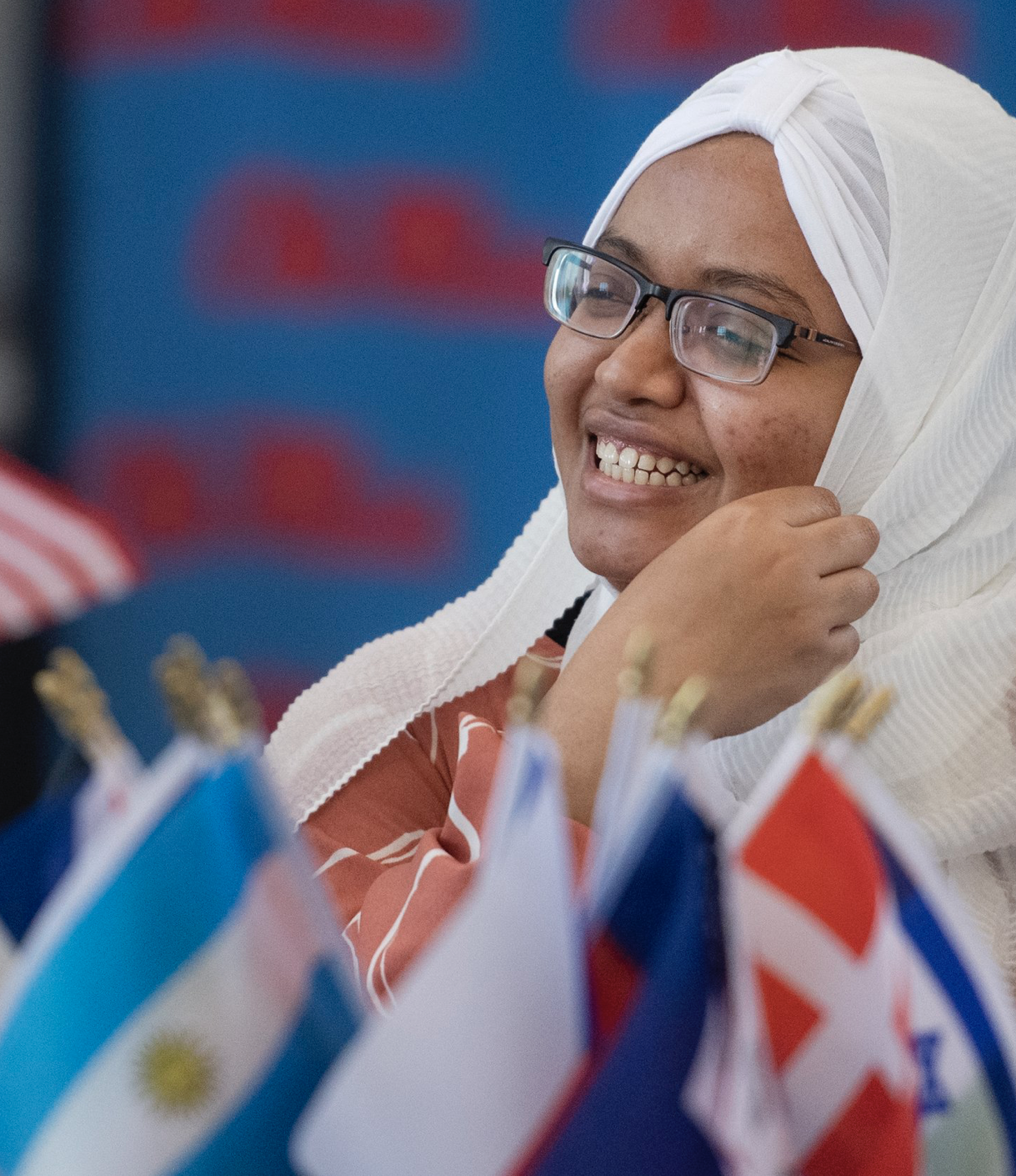 female student smiles during UM campus event