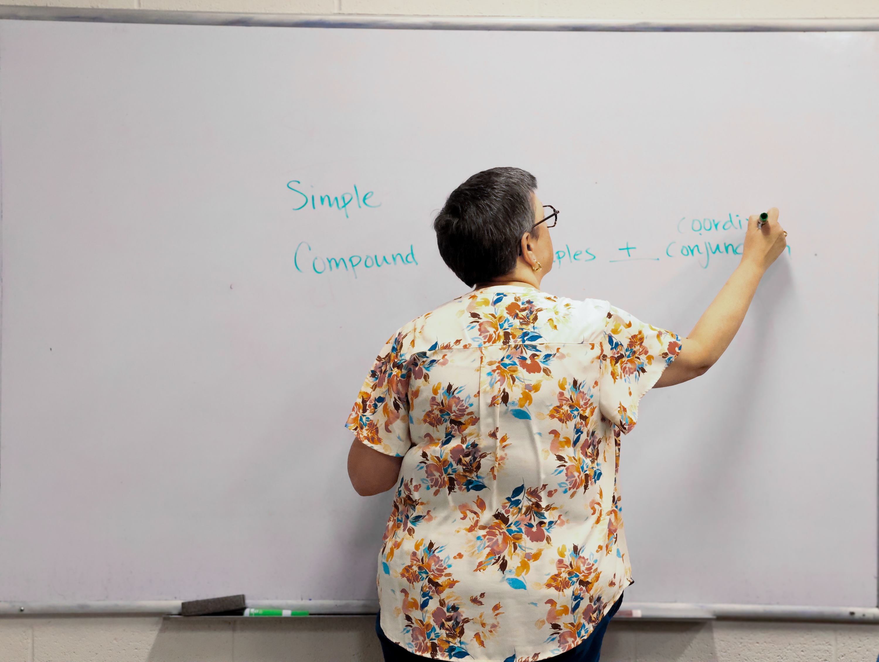 Director and Instructor Whitney Sarver provides instruction during an Intensive English Program course.