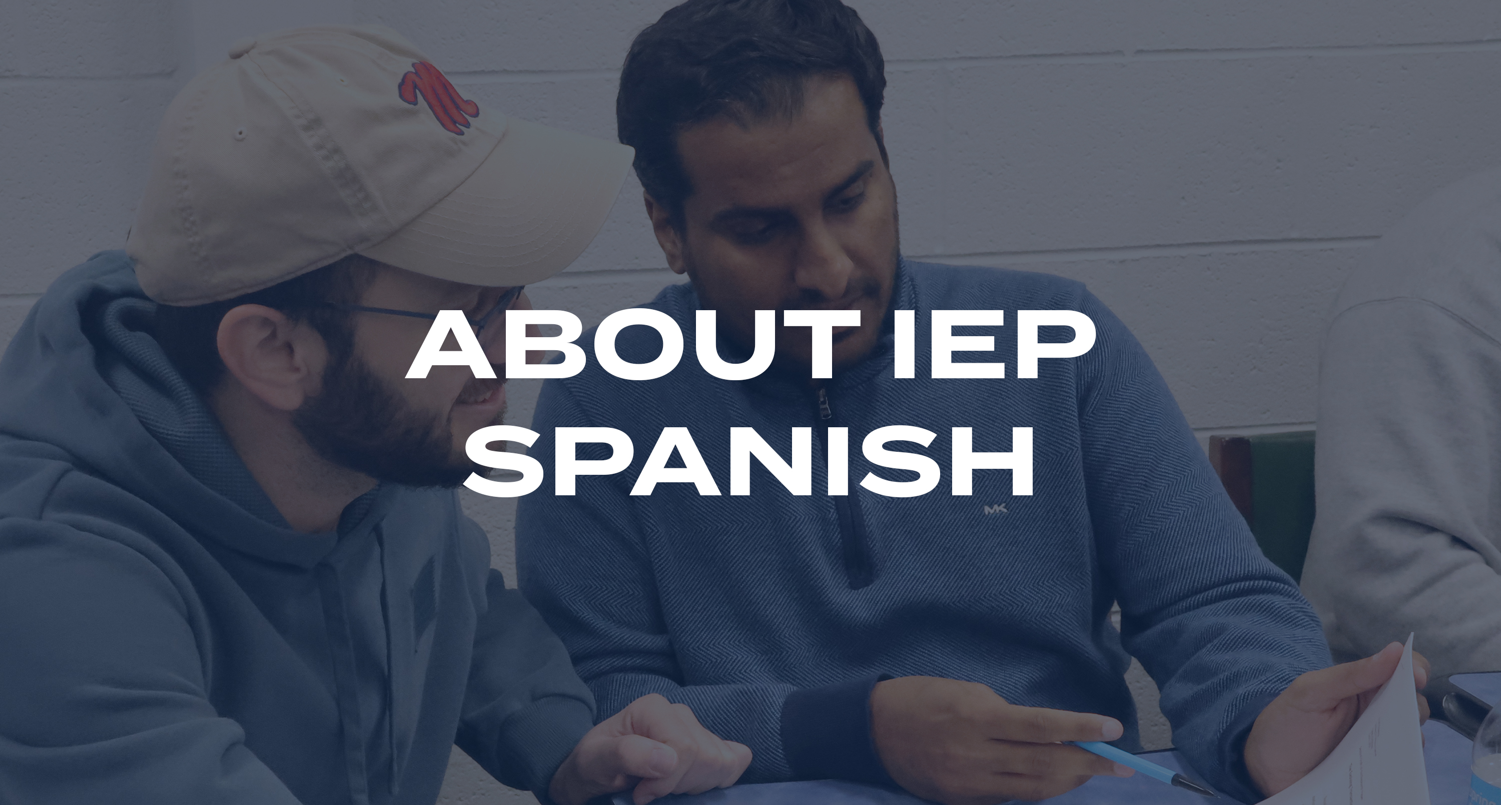 A group of students studies English in a class for the Intensive English Program
