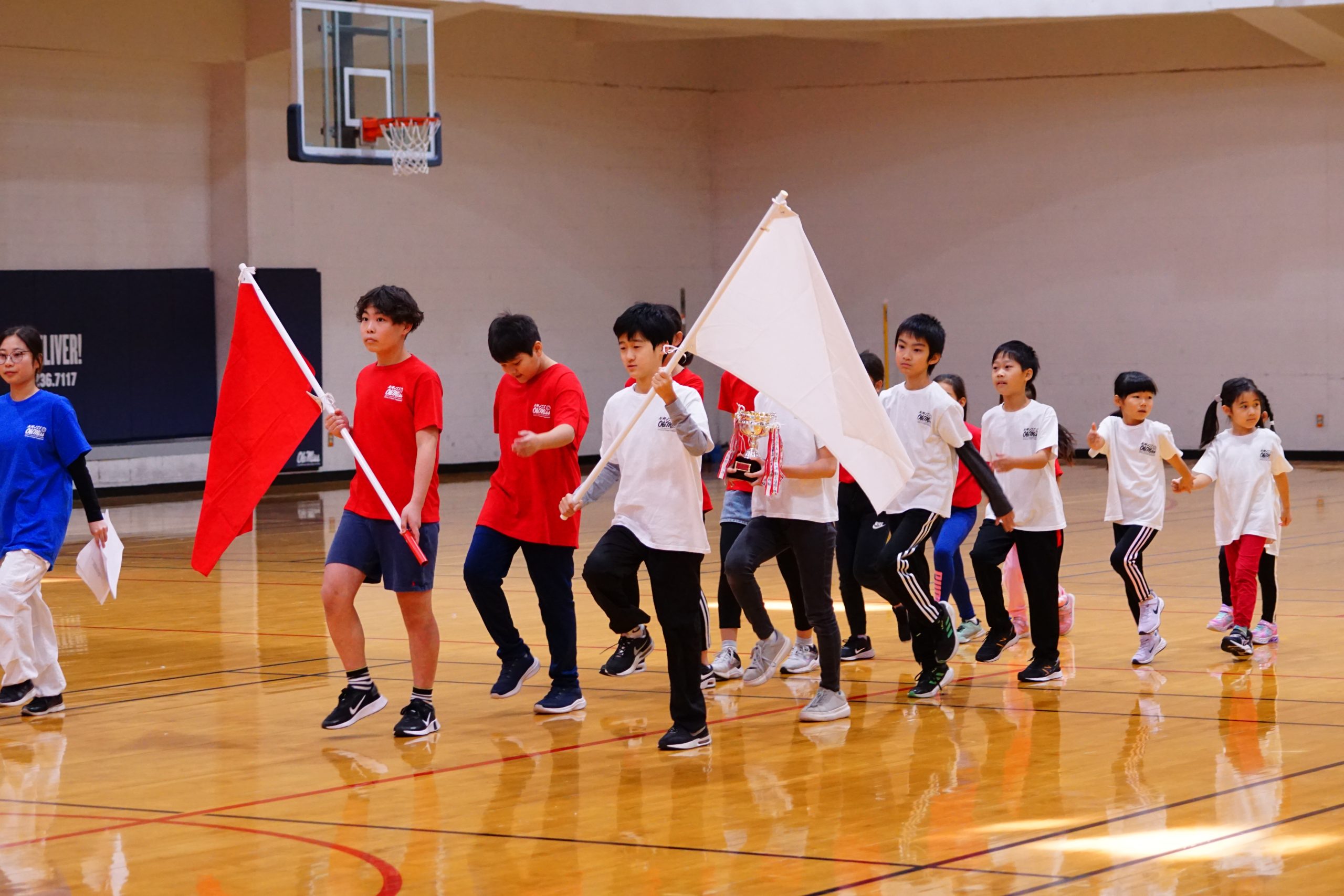Japanese students march during a gym class