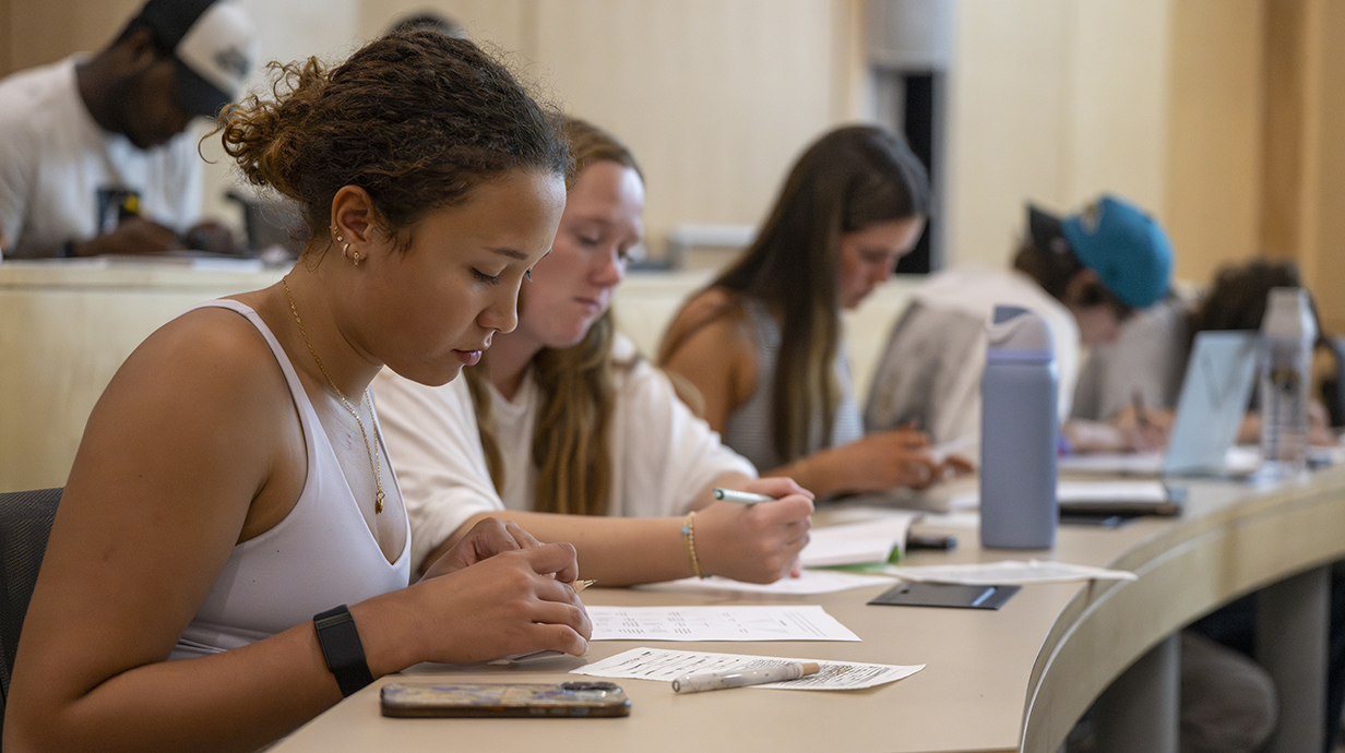 Students take an exam during class