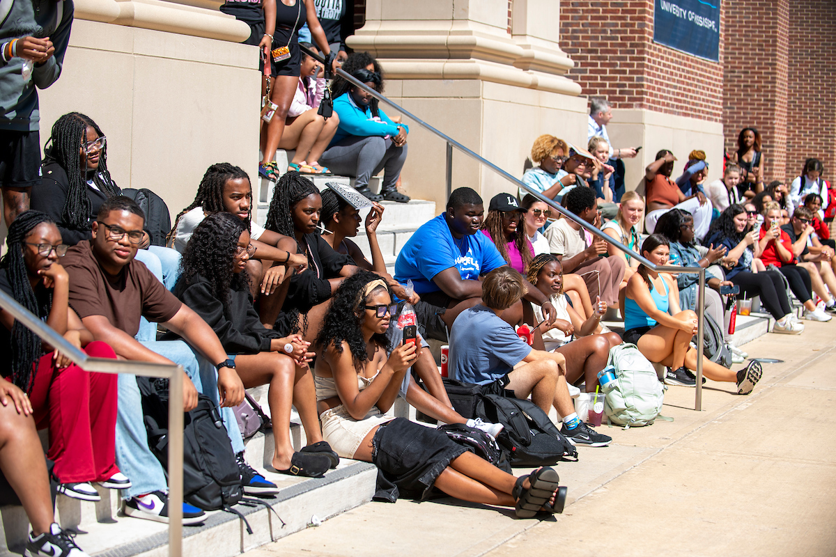 Students sitting on the stairs of the Union