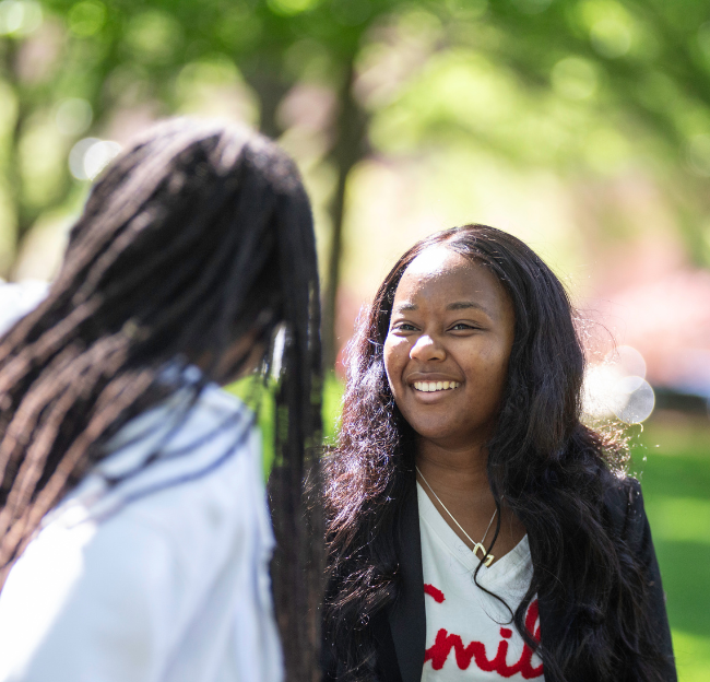 Two university students having a conversation.