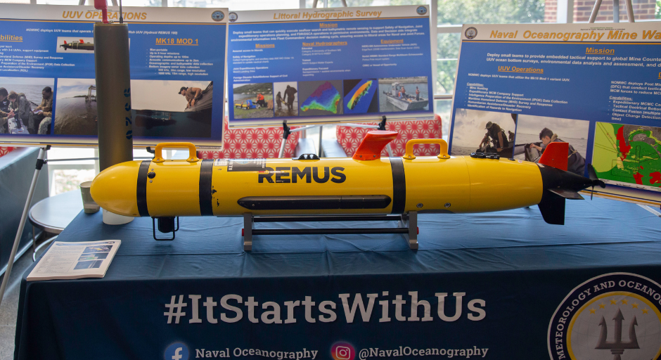 A model torpedo sits on a table.