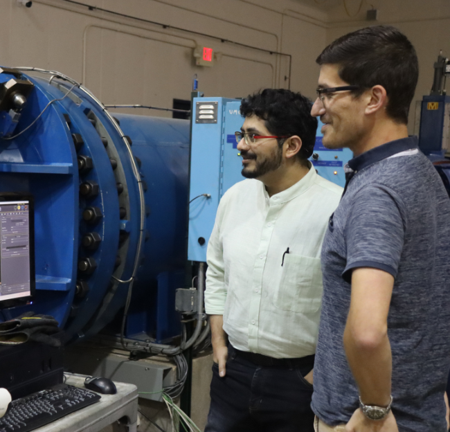 Researchers look at the results of a test on the wind tunnel at NCPA. 