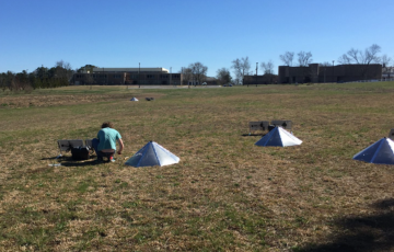 Image of researchers using the tornado detection technology in the field.