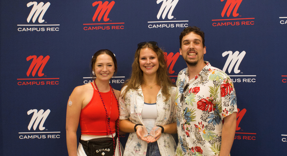 Student employee receiving award.
