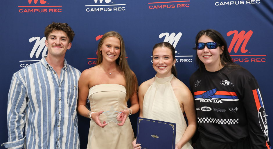 Student employees receiving award.