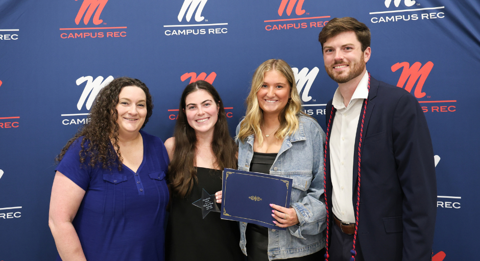Student employees receiving award.
