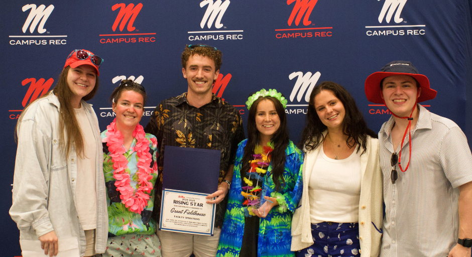 Student employee receiving award.