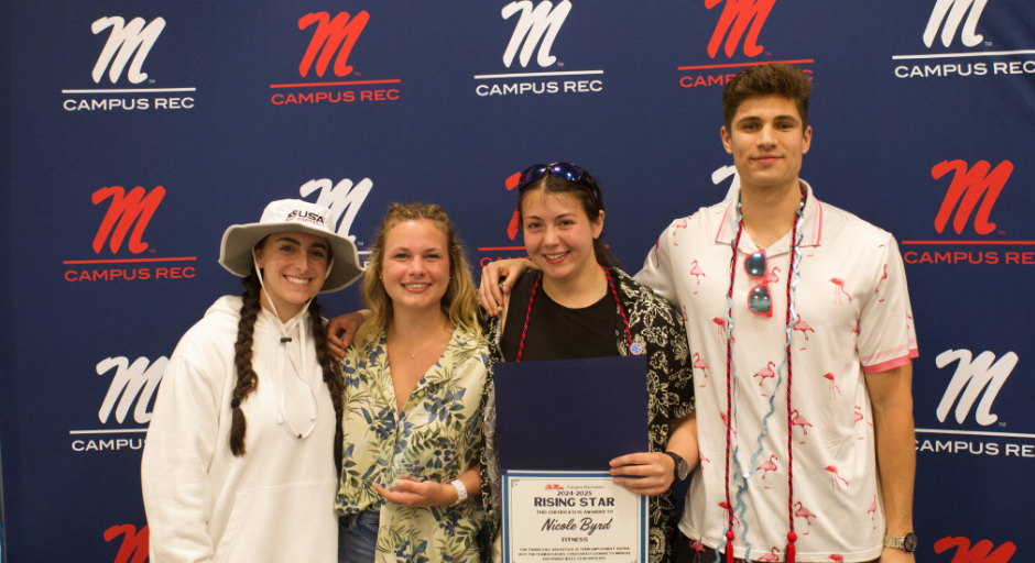 Student employees receiving award.