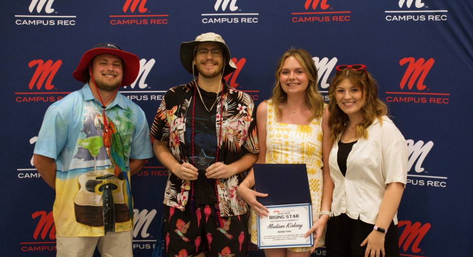 Student employees receiving award.
