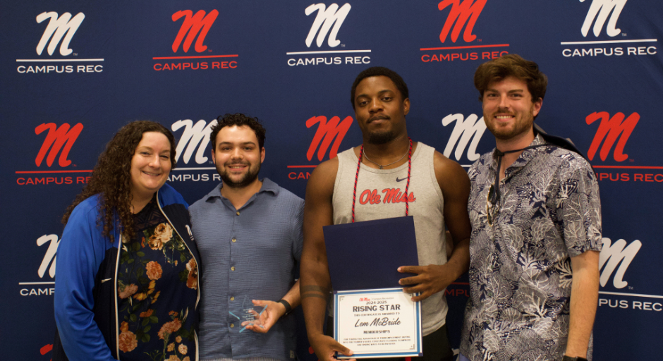 Student employees receiving award.
