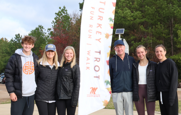 Family together at Turkey Trot event