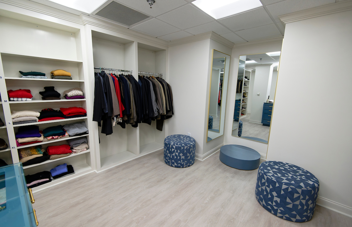 Clothing lining the hallways at the career center