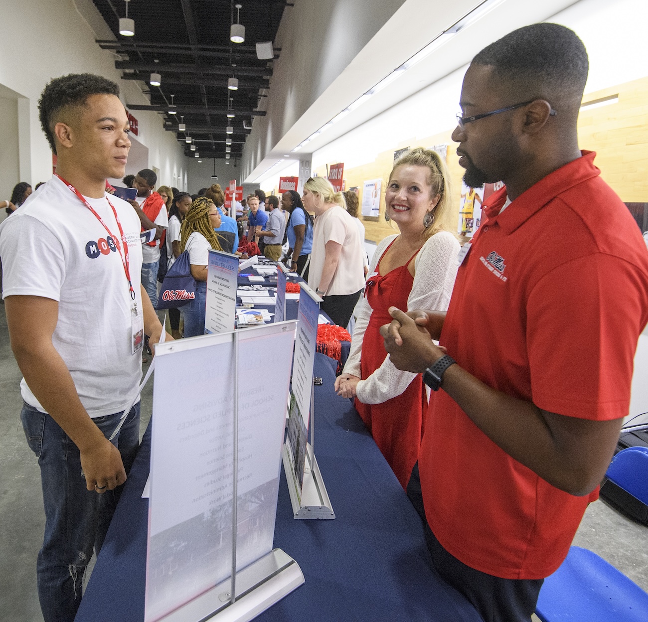 A student talks to a volunteer at the MOST Conference